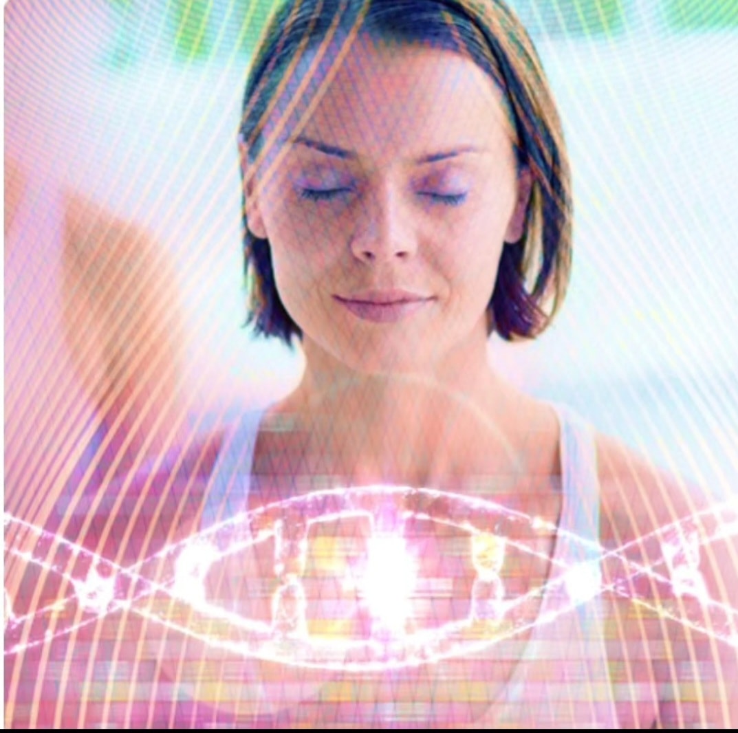 Woman with energy healing light visualization